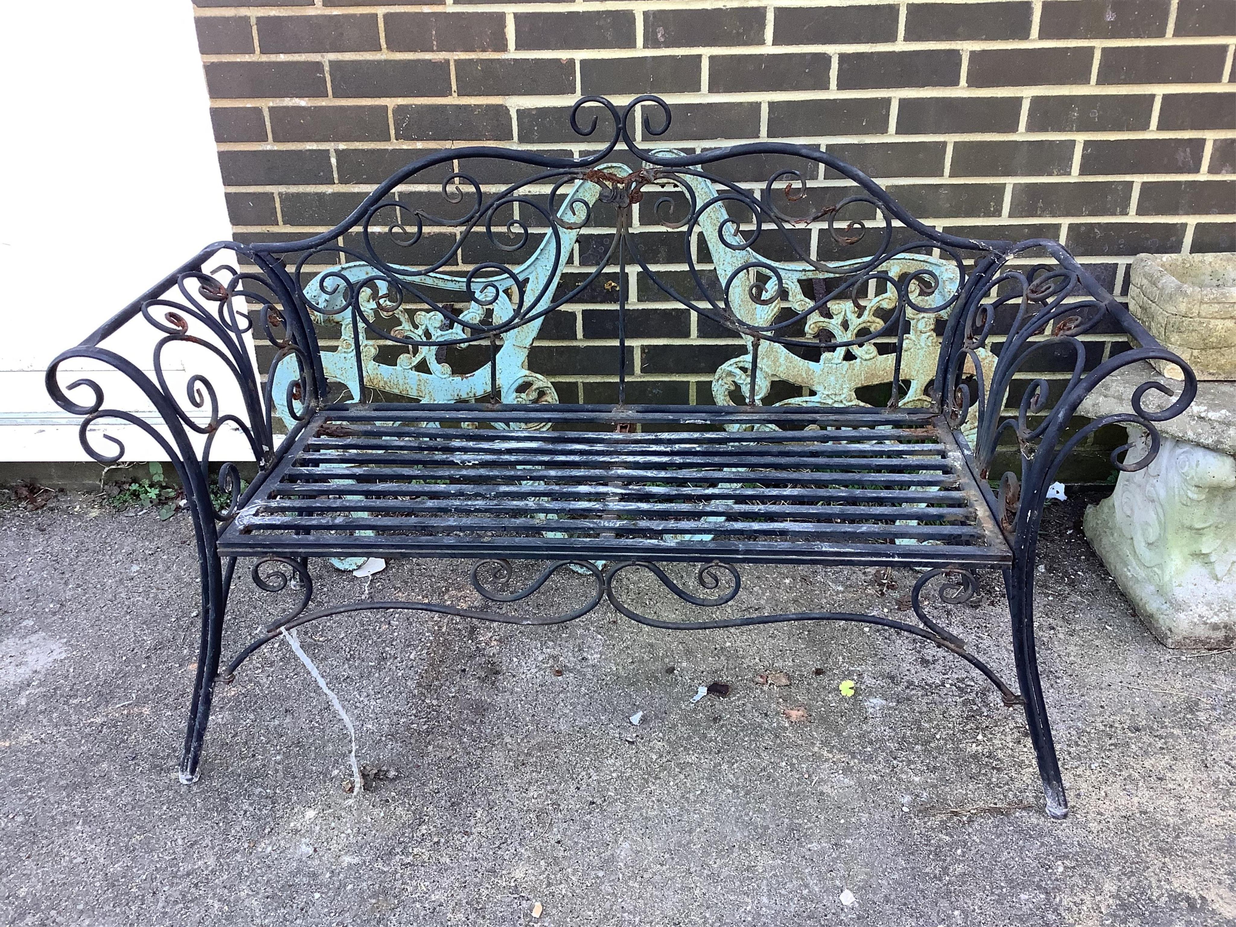 A metal garden bench, width 130cm, depth 45cm, height 87cm together with a pair of bench ends. Condition - fair